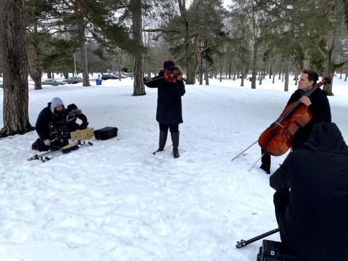 Tanya Charles Iveniuk and Samuel Bisson of the Odin Quartet during a winter music video shoot in Toronto's High Park.
